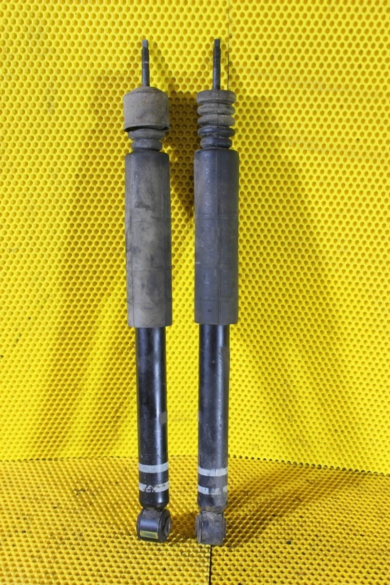 Амортизатор подвески Nissan Tiida E6210EC80A C11