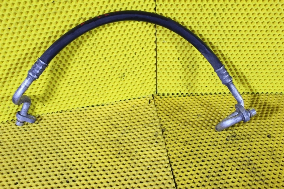 Трубка кондиционера Nissan Note 92490AX60B E11