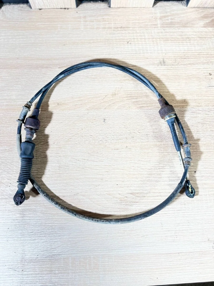 Трос АКПП Nissan March 34935AX100 K12