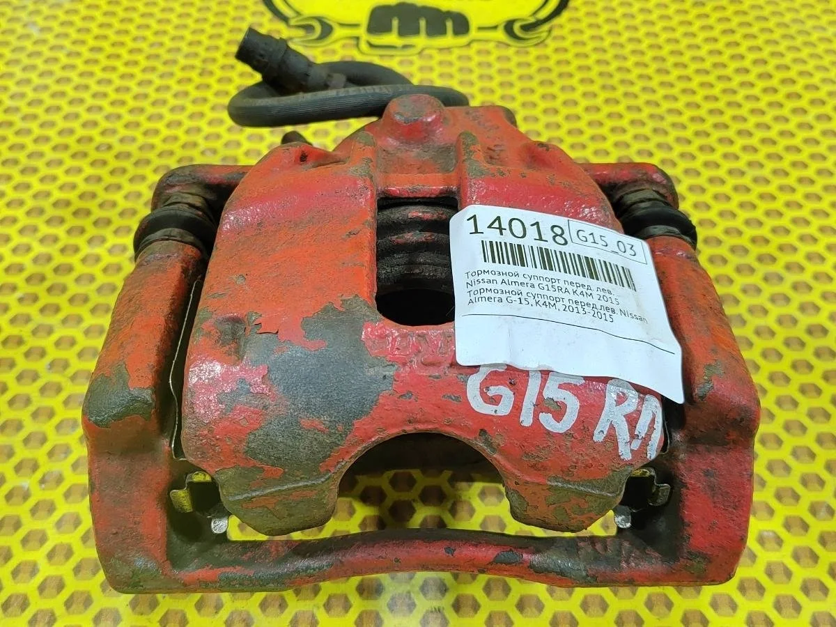 Суппорт Nissan Almera 2015 7481100Q0B K4M, передний левый