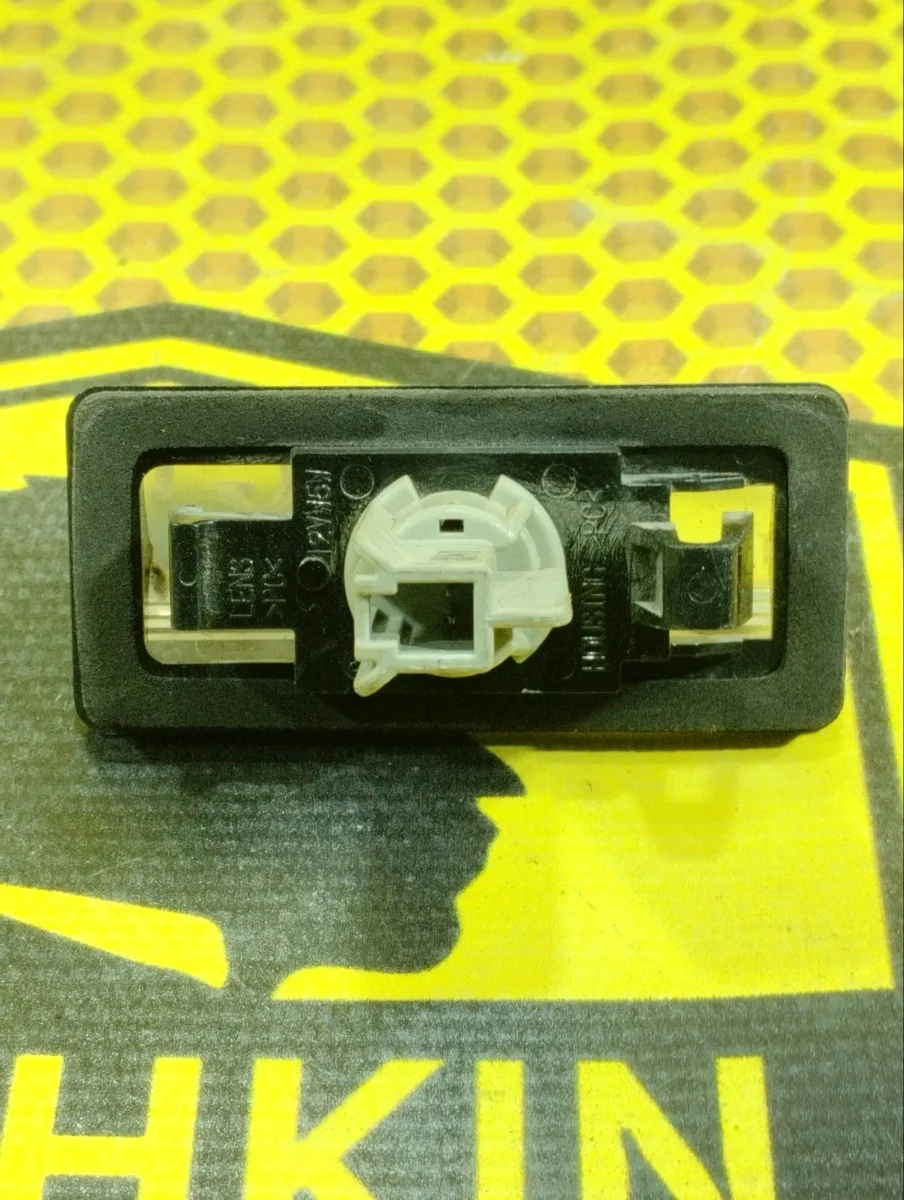 Подсветка номера Nissan Almera 2015 265109Y00A K4M