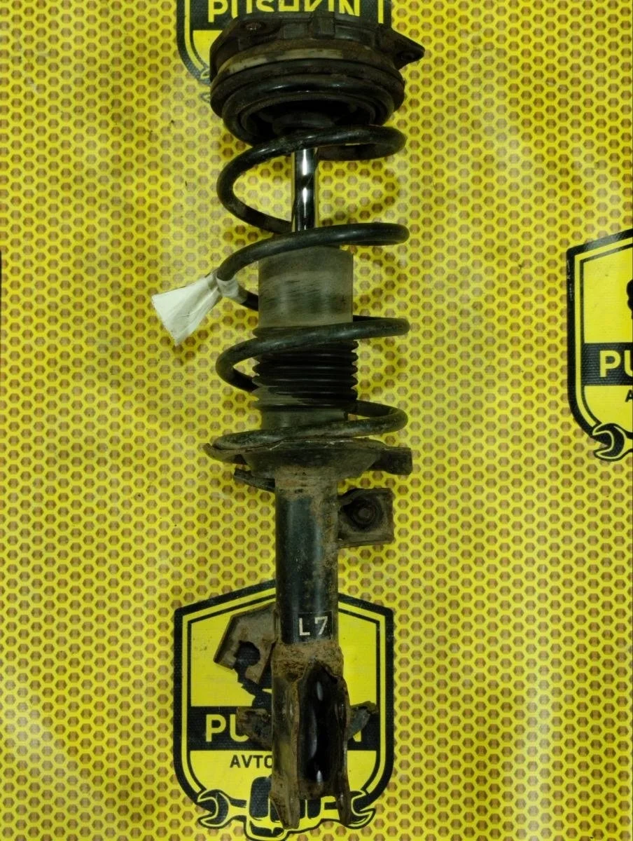 Амортизатор подвески Nissan Tiida 2008 E4303EC80A C11 HR16DE, передний левый