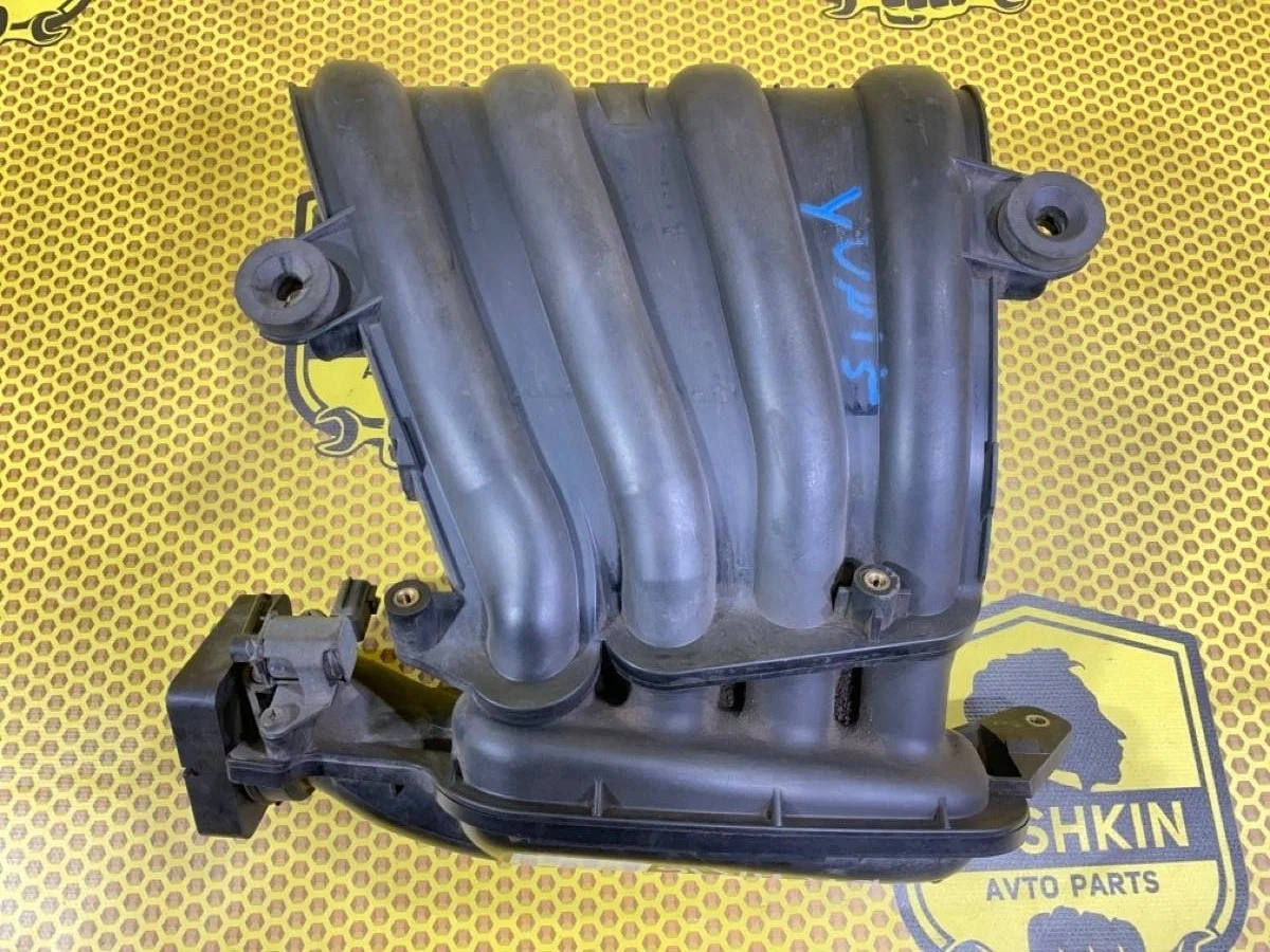 Коллектор впускной Nissan Note 2007 14001EE00B E11 HR16DE