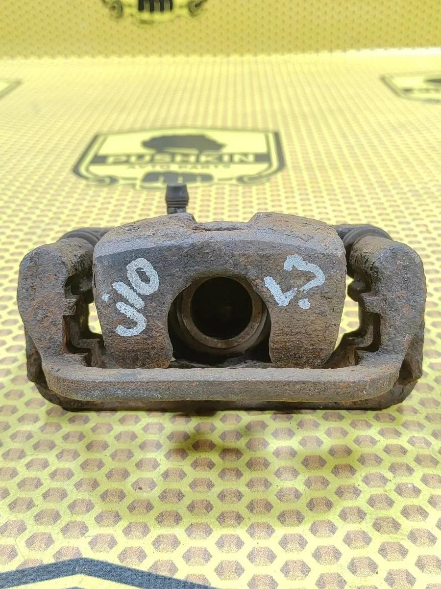 Суппорт Nissan Qashqai 2008 44011EM11A J10E HR16DE, задний левый