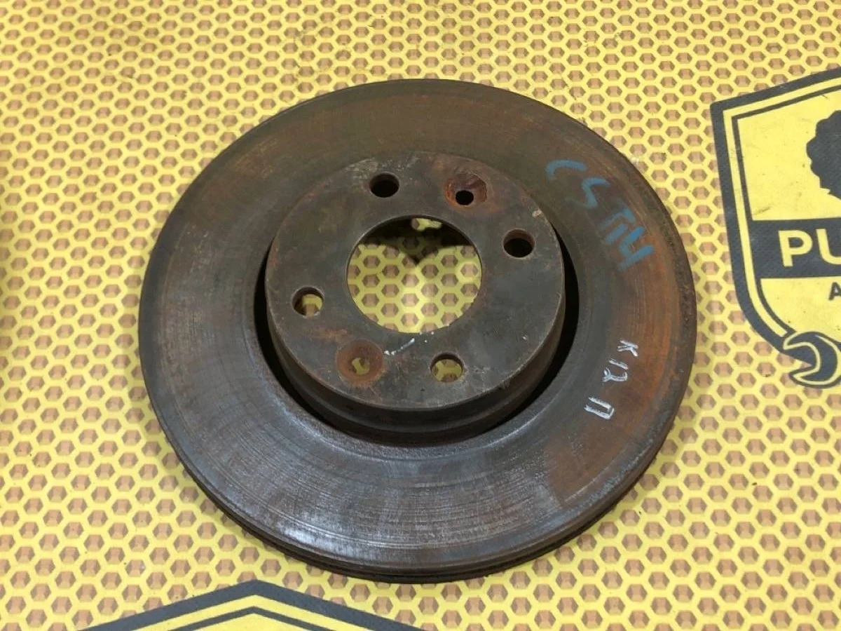 Диск тормозной Nissan Micra 40206AX600, передний