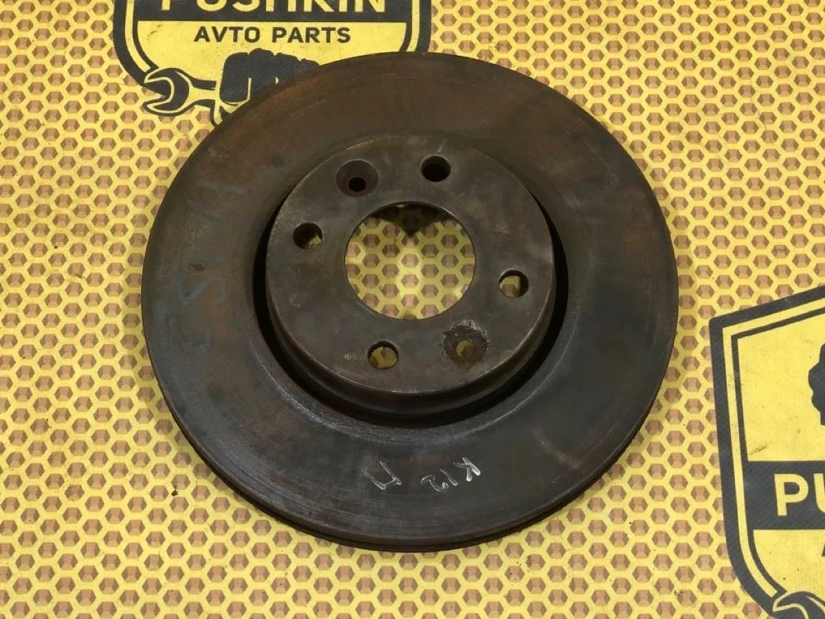 Диск тормозной Nissan Micra 40206AX600, передний