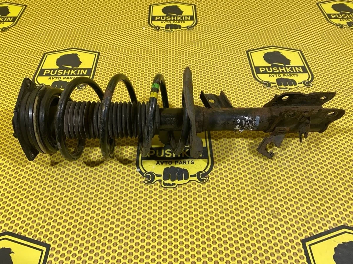 Амортизатор подвески Nissan Qashqai E4302JE21A J10, передний правый