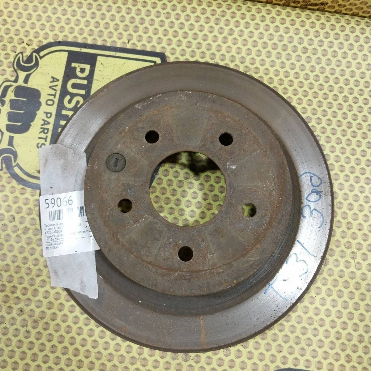 Диск тормозной Nissan Xtrail 2009 43206JD00A T31 MR20, задний