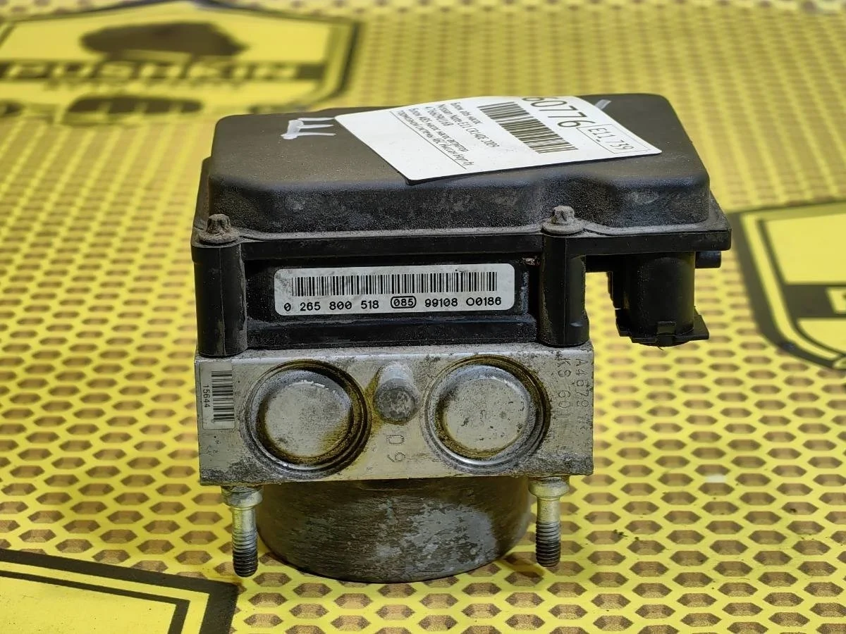 Блок АБС Nissan Note 2009 476609U16B E11 CR14DE
