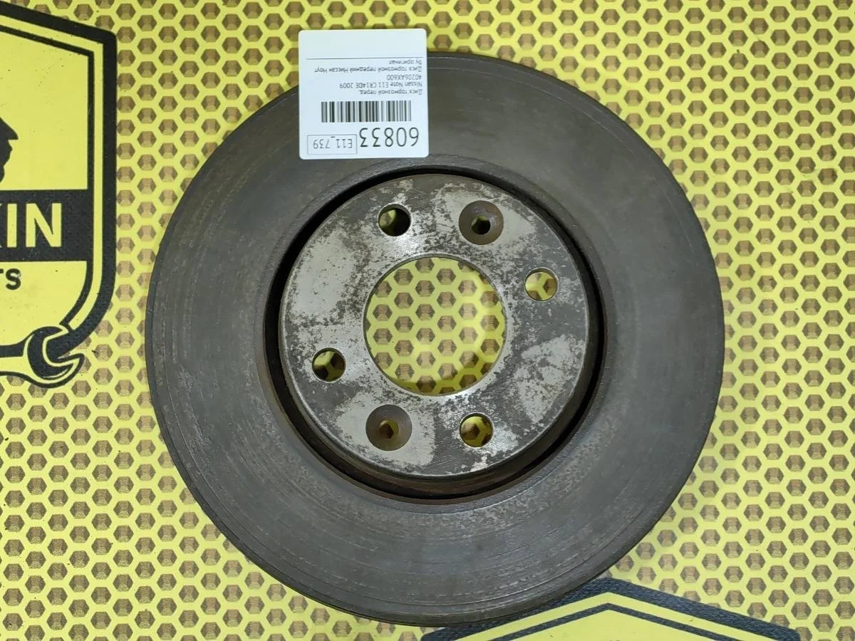 Диск тормозной Nissan Note 2009 40206AX600 E11 CR14DE, передний
