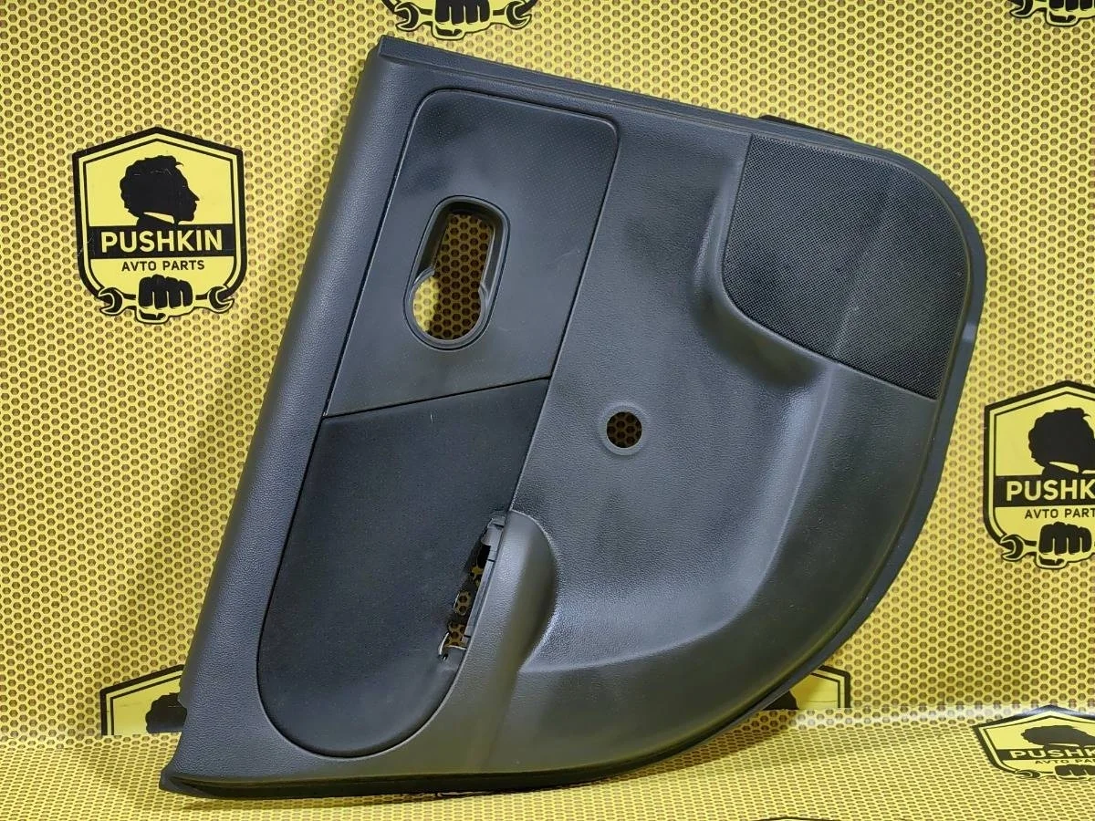 Обшивка двери Nissan Note 2009 829019U14D E11 CR14DE, задняя левая