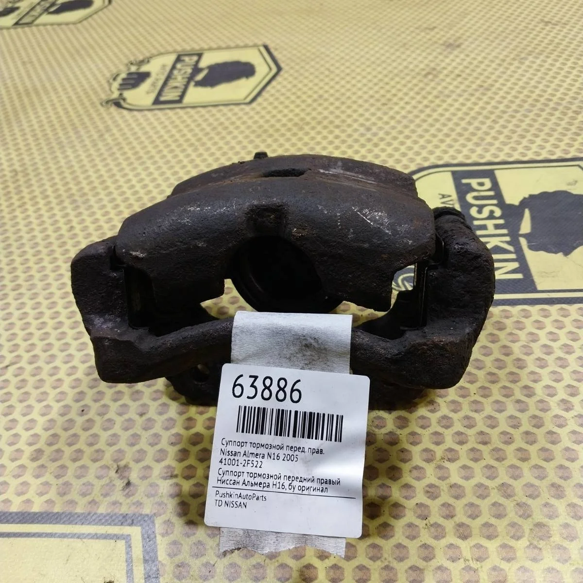 Суппорт Nissan Almera 2005 410012F522 N16, передний правый