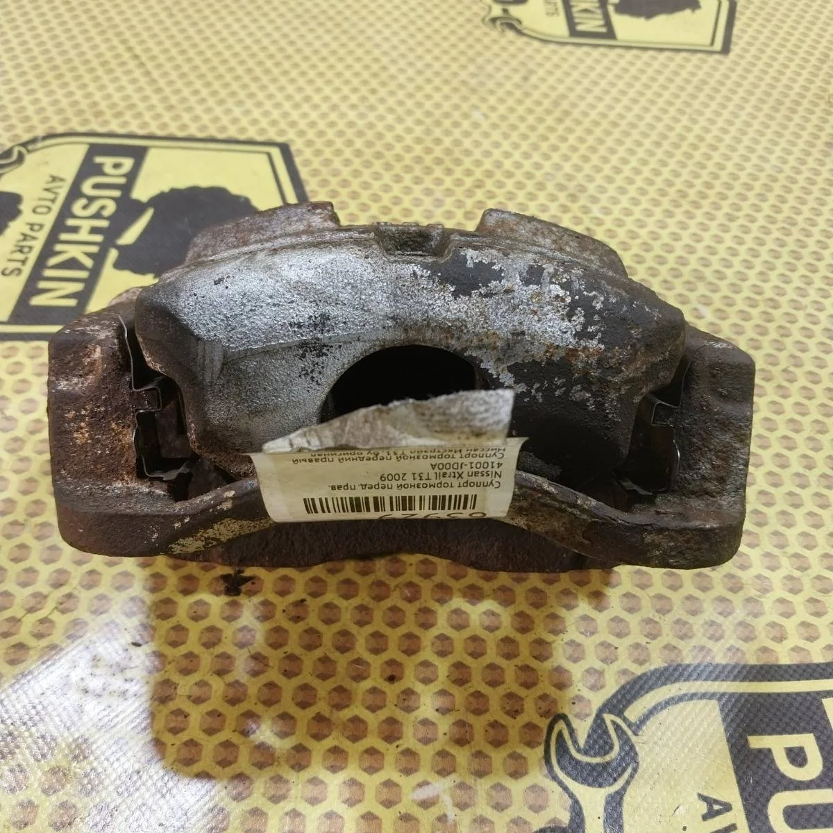 Суппорт Nissan Xtrail 2009 41001JD00A T31, передний правый