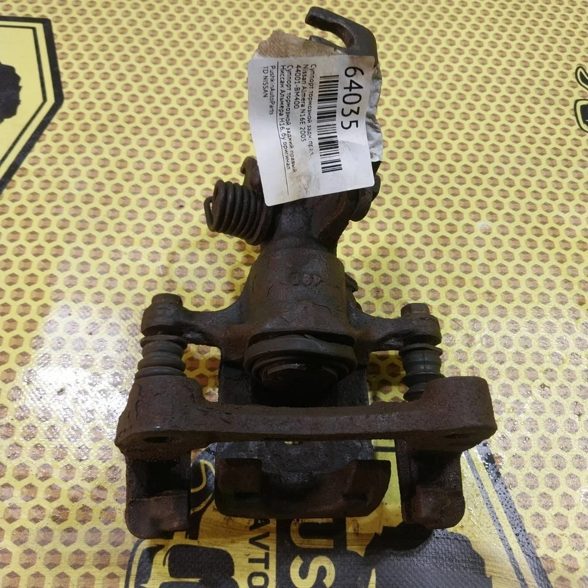 Суппорт Nissan Almera 2005 44001BM400 N16E, задний правый