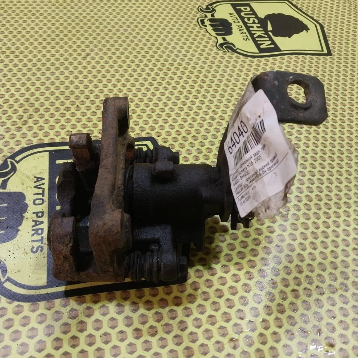 Суппорт Nissan Almera 2005 44001BM400 N16, задний правый