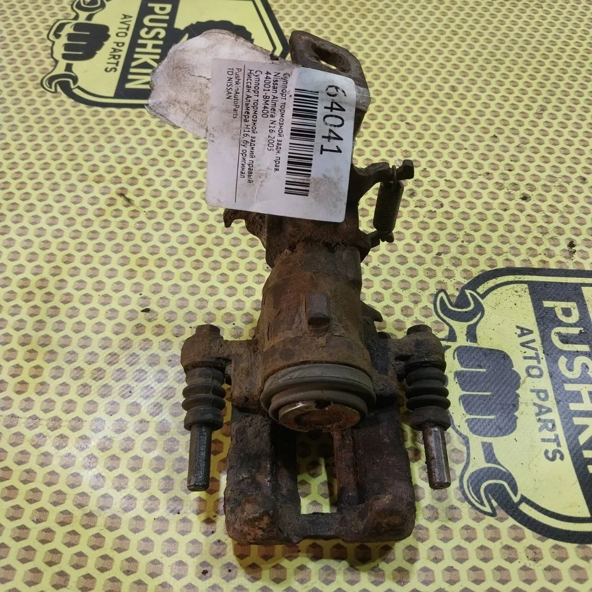 Суппорт Nissan Almera 2005 44001BM400 N16, задний правый