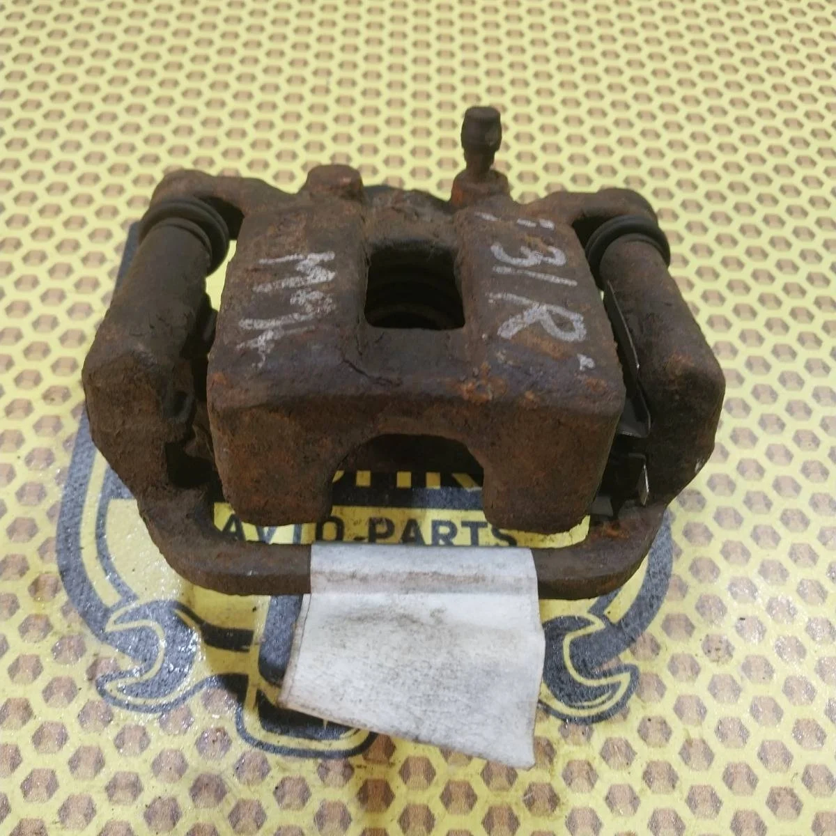 Суппорт Nissan Xtrail 2009 44011JG00A T31, задний левый