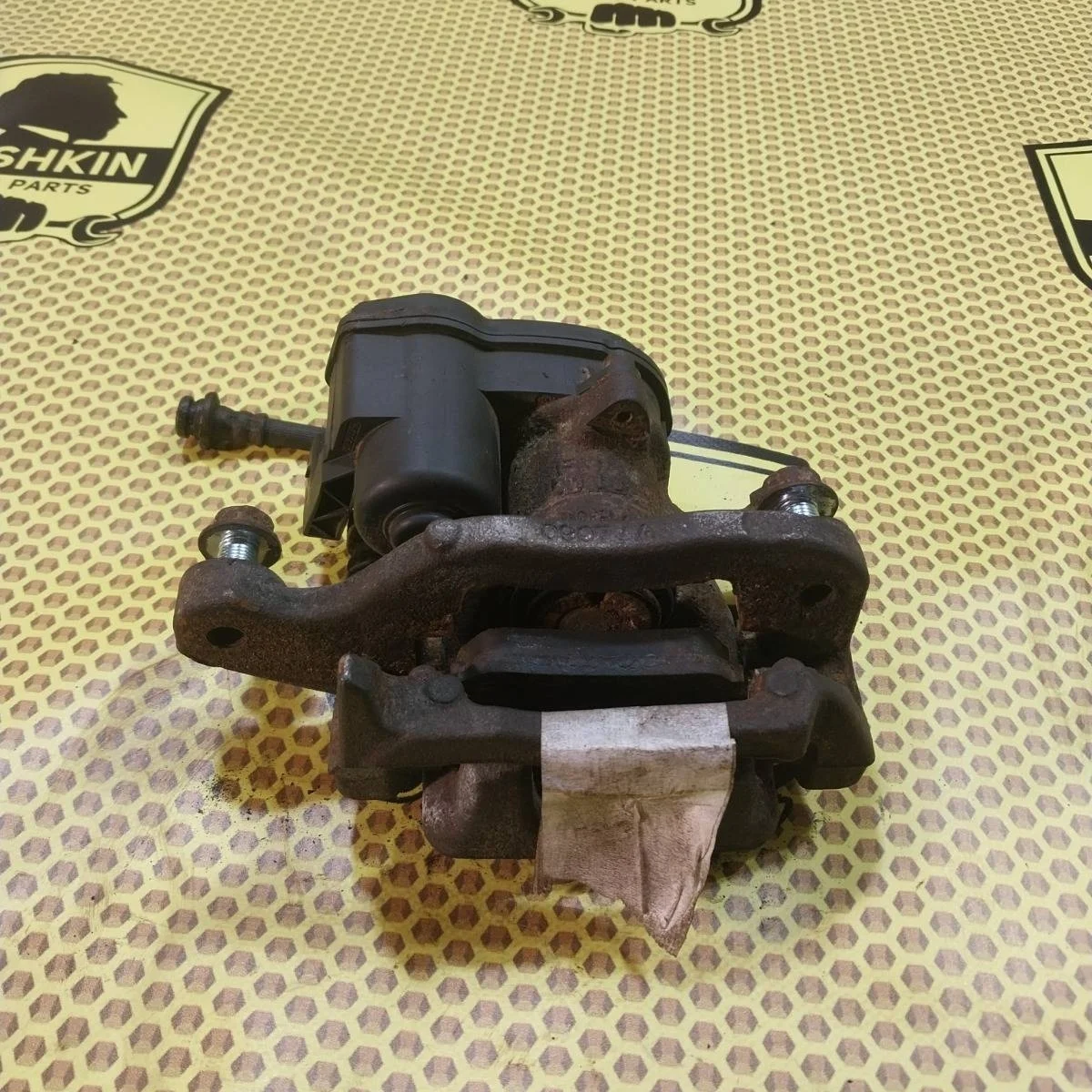 Суппорт Nissan Qashqai 2014 440114EA0A J11, задний левый