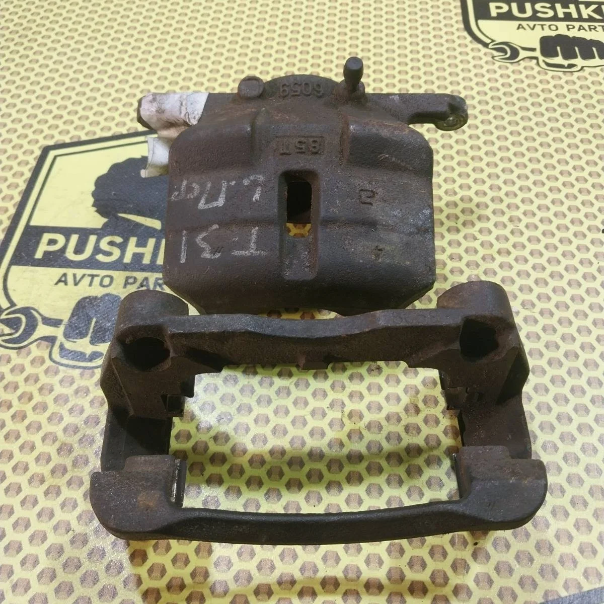 Суппорт Nissan Xtrail 2009 41011JD00A T31, передний левый