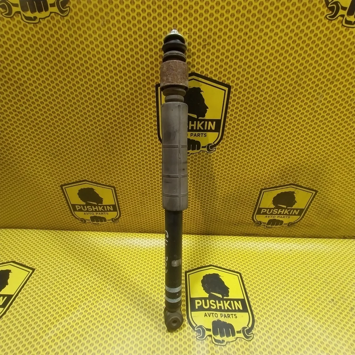 Амортизатор подвески Nissan Tiida 2009 E6200ZN90A C11, задний