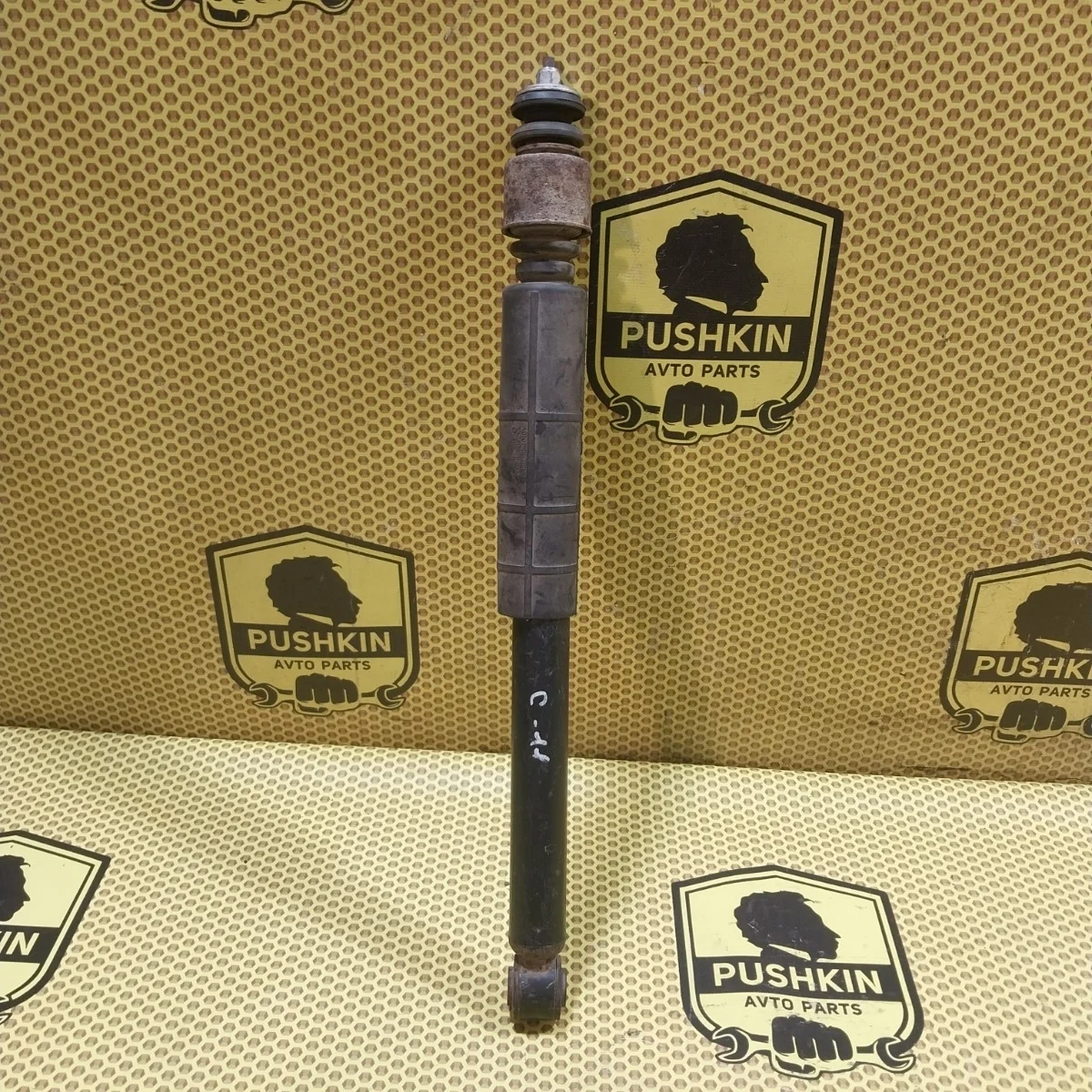 Амортизатор подвески Nissan Tiida 2009 E6200ZN90A C11, задний