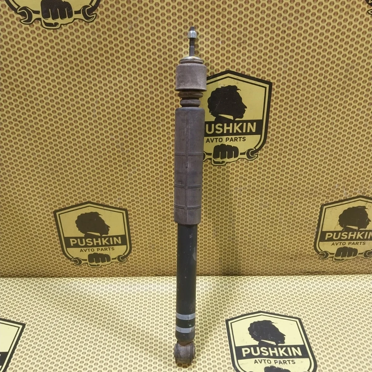 Амортизатор подвески Nissan Tiida 2009 E6200ZN90A C11, задний