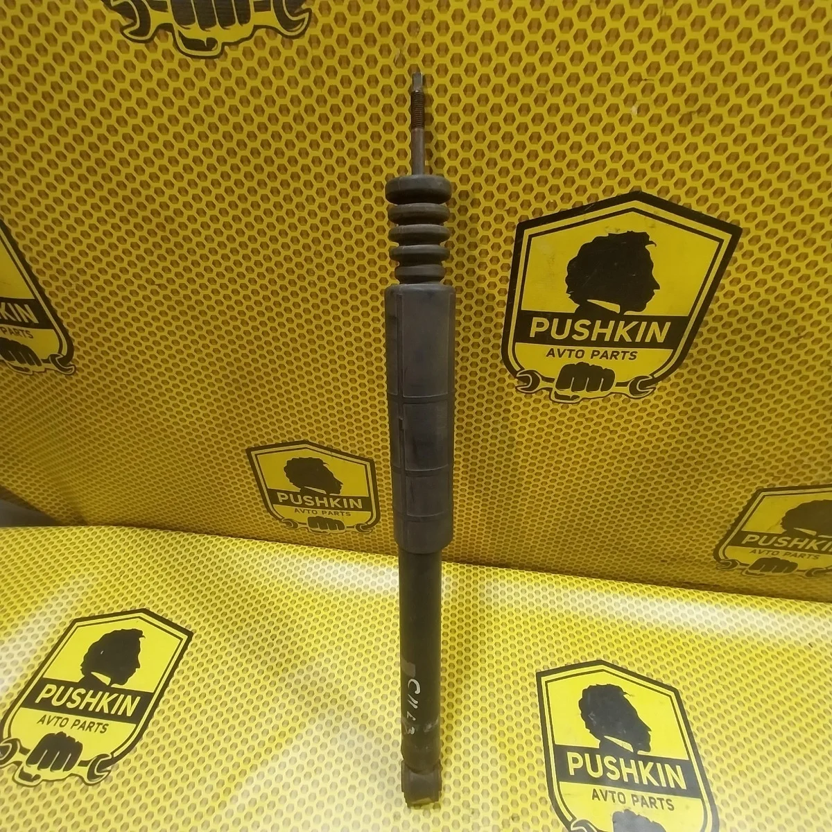 Амортизатор подвески Nissan Tiida 2009 E6200ZN90A C11, задний