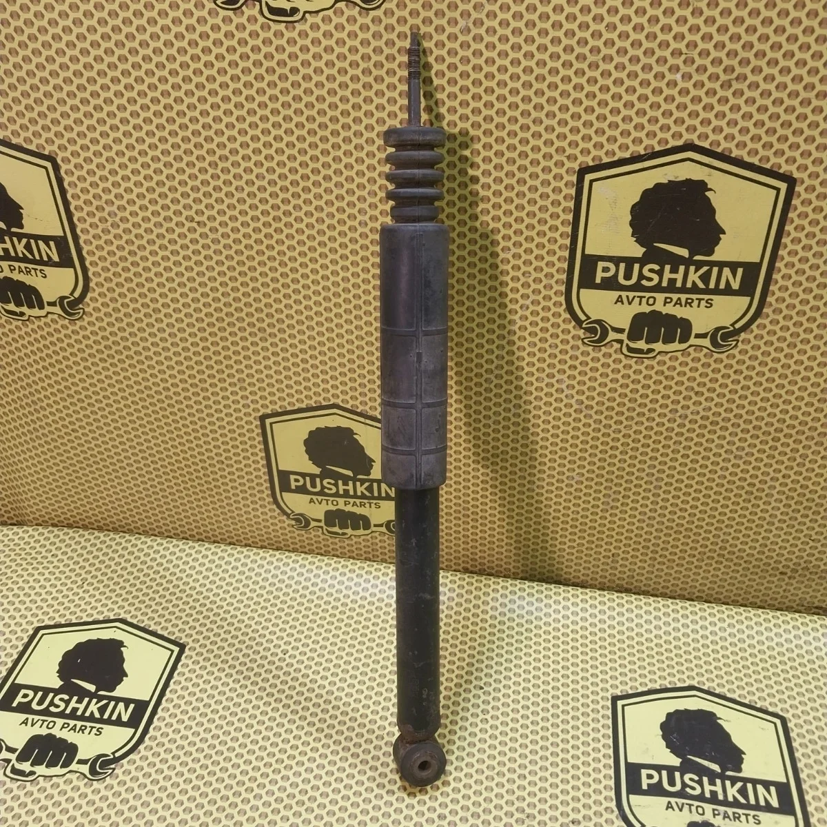 Амортизатор подвески Nissan Tiida 2009 E6200ZN90A C11, задний