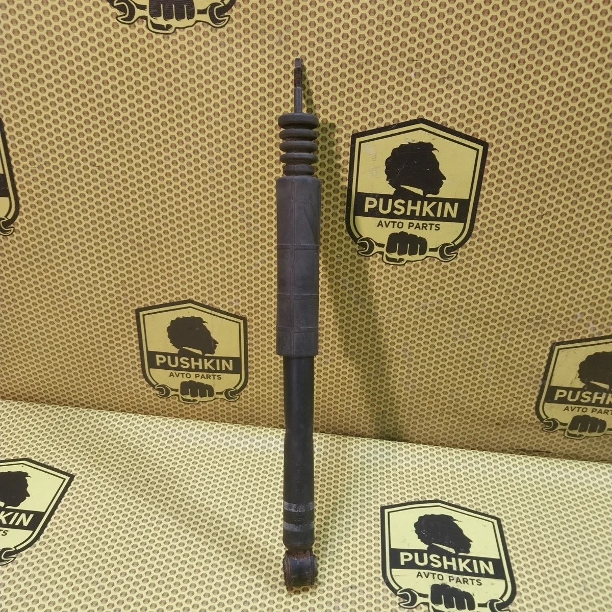 Амортизатор подвески Nissan Tiida 2009 E6200ZN90A C11, задний