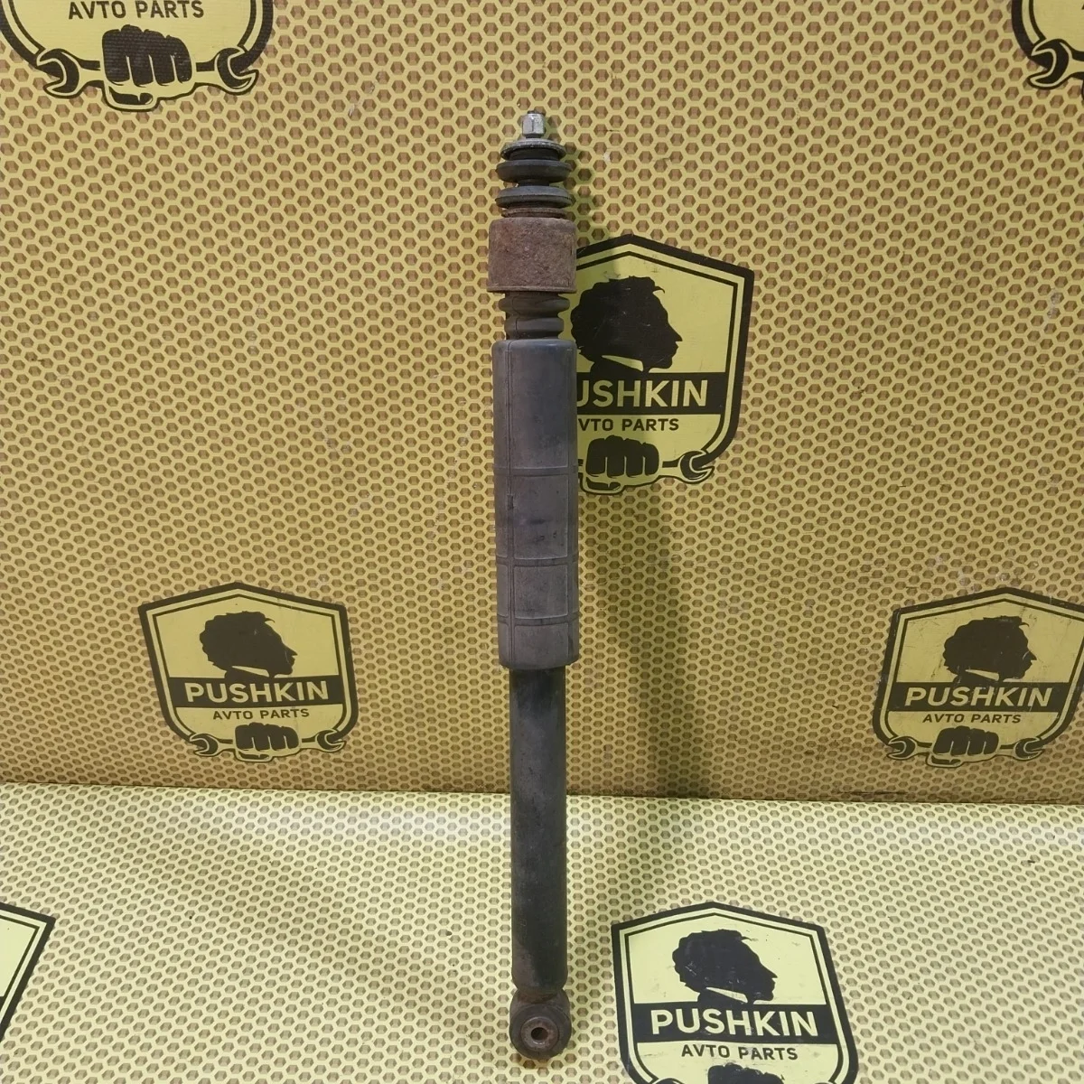 Амортизатор подвески Nissan Tiida 2009 E6200ZN90A C11, задний