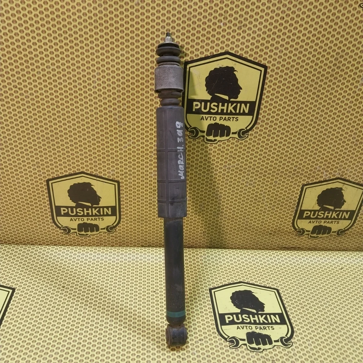 Амортизатор подвески Nissan Tiida 2009 E6200ZN90A C11, задний