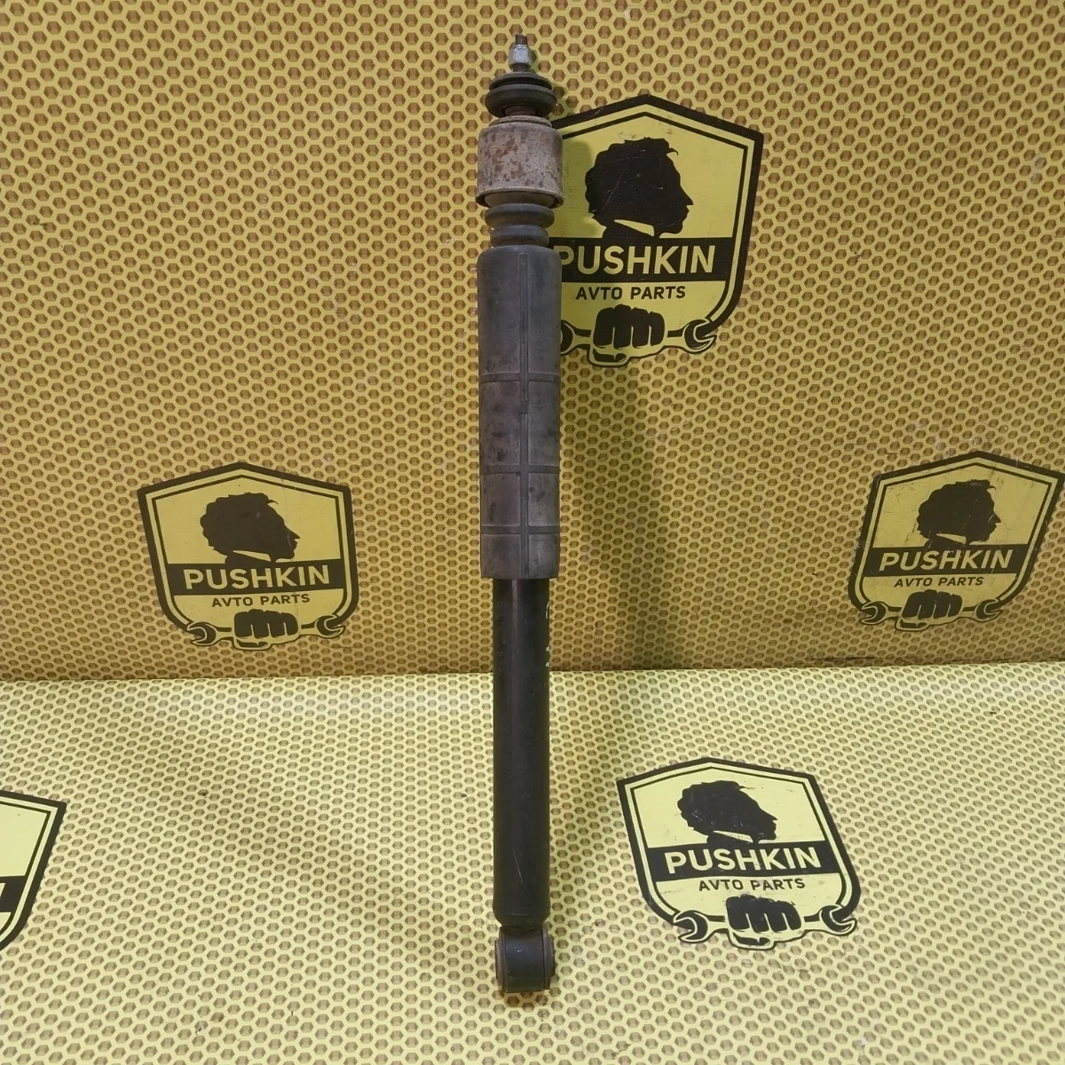 Амортизатор подвески Nissan Tiida 2009 E6200ZN90A C11, задний