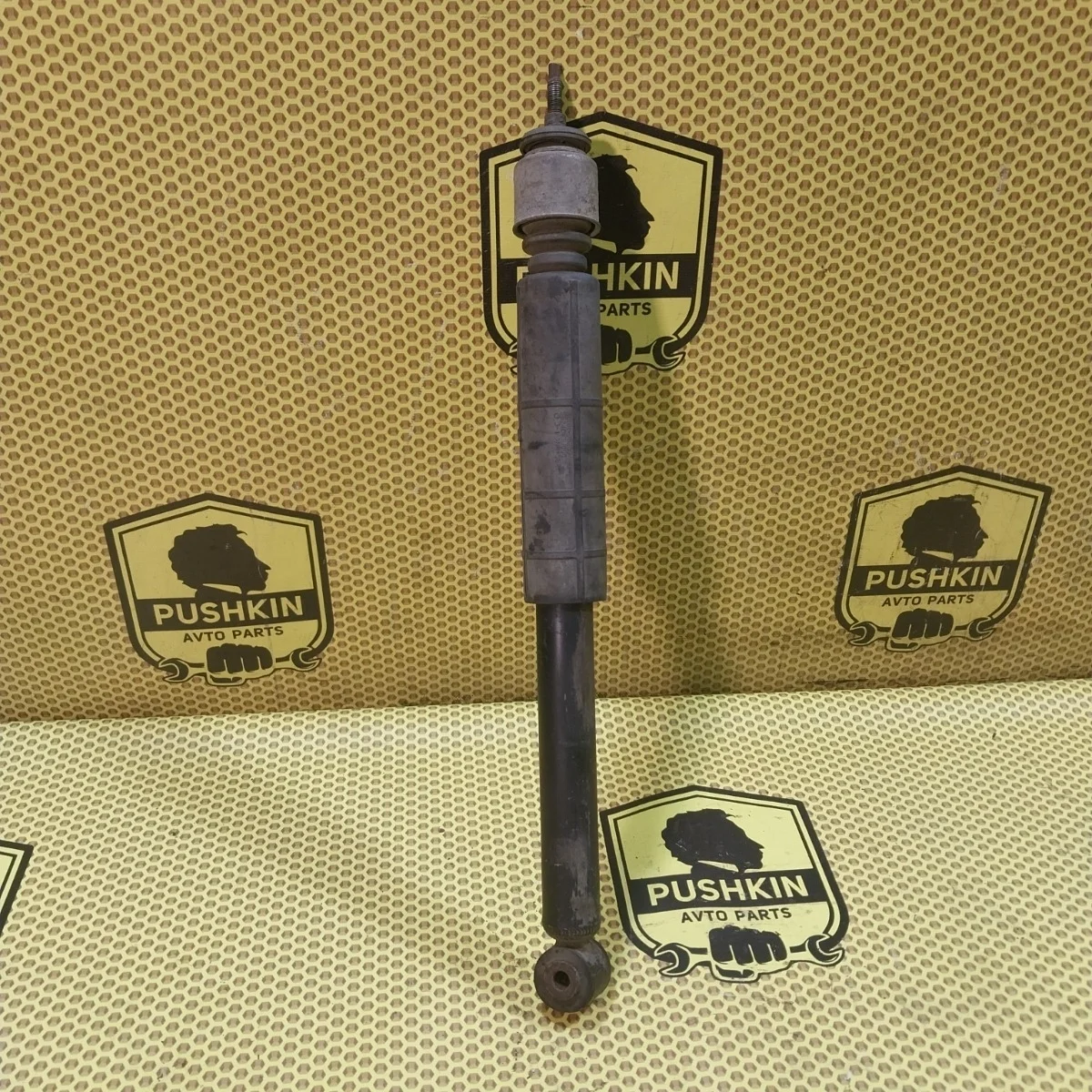 Амортизатор подвески Nissan Tiida 2009 E6200ZN90A C11, задний