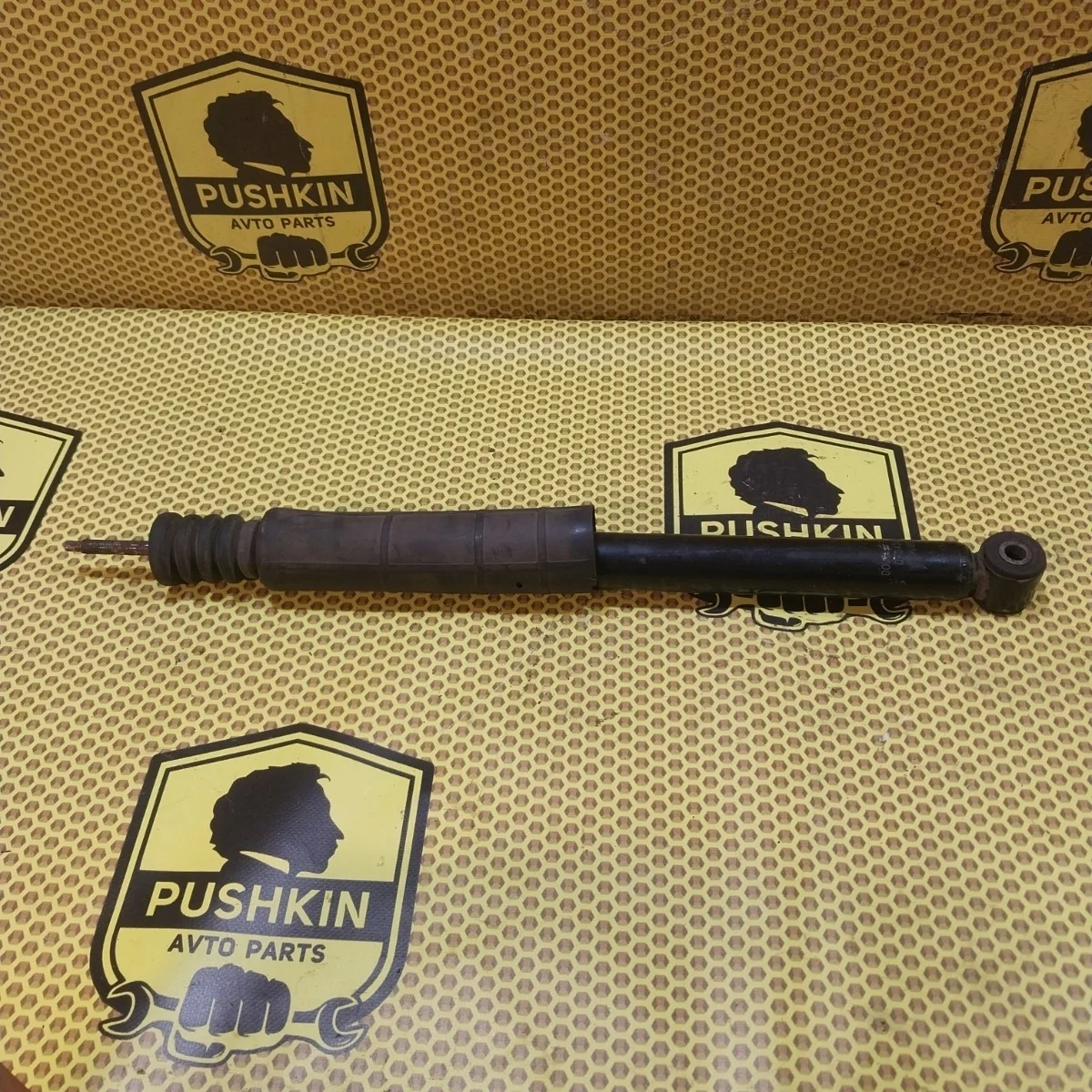 Амортизатор подвески Nissan Tiida 2009 E6200ZN90A C11, задний