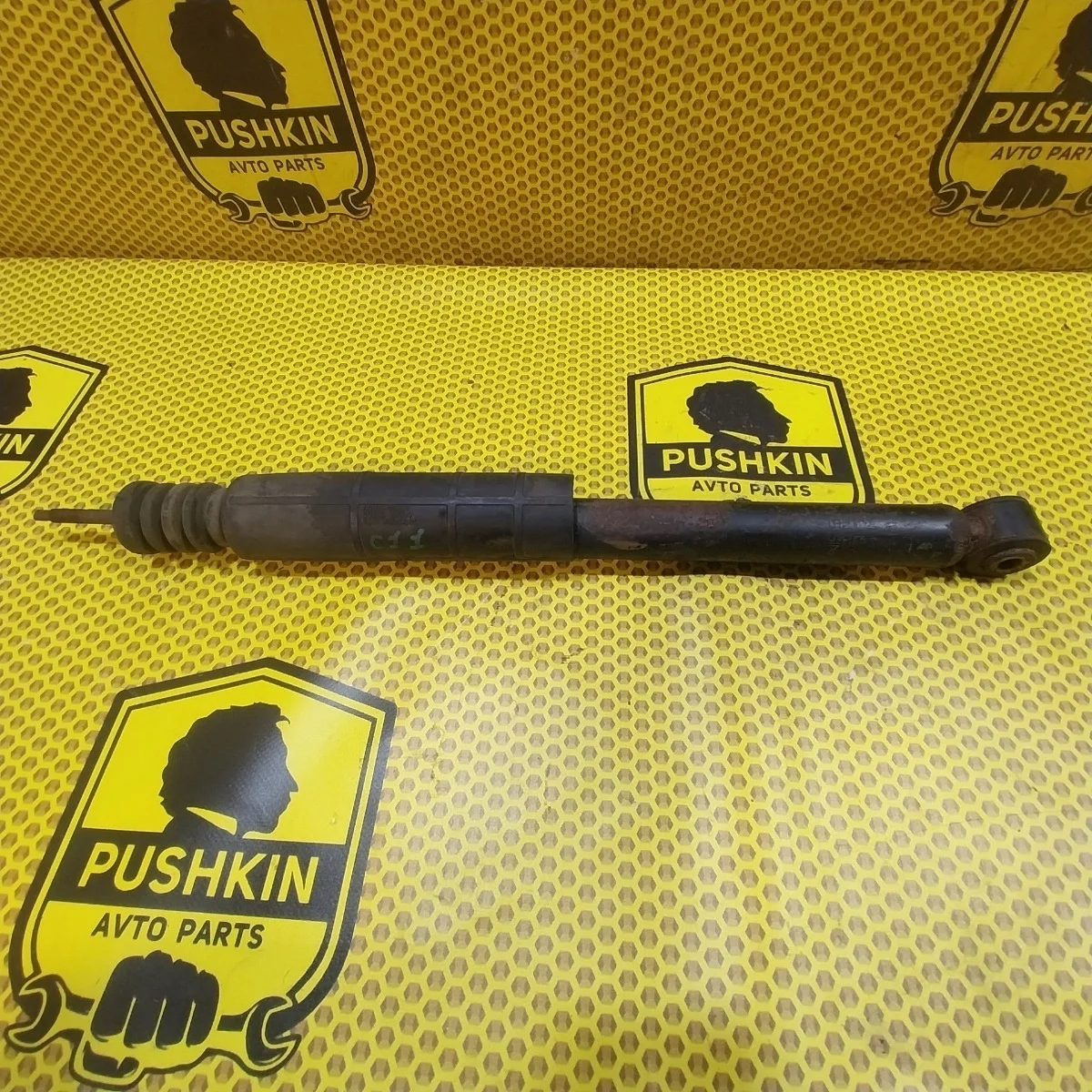 Амортизатор подвески Nissan Tiida 2009 E6200ZN90A C11, задний