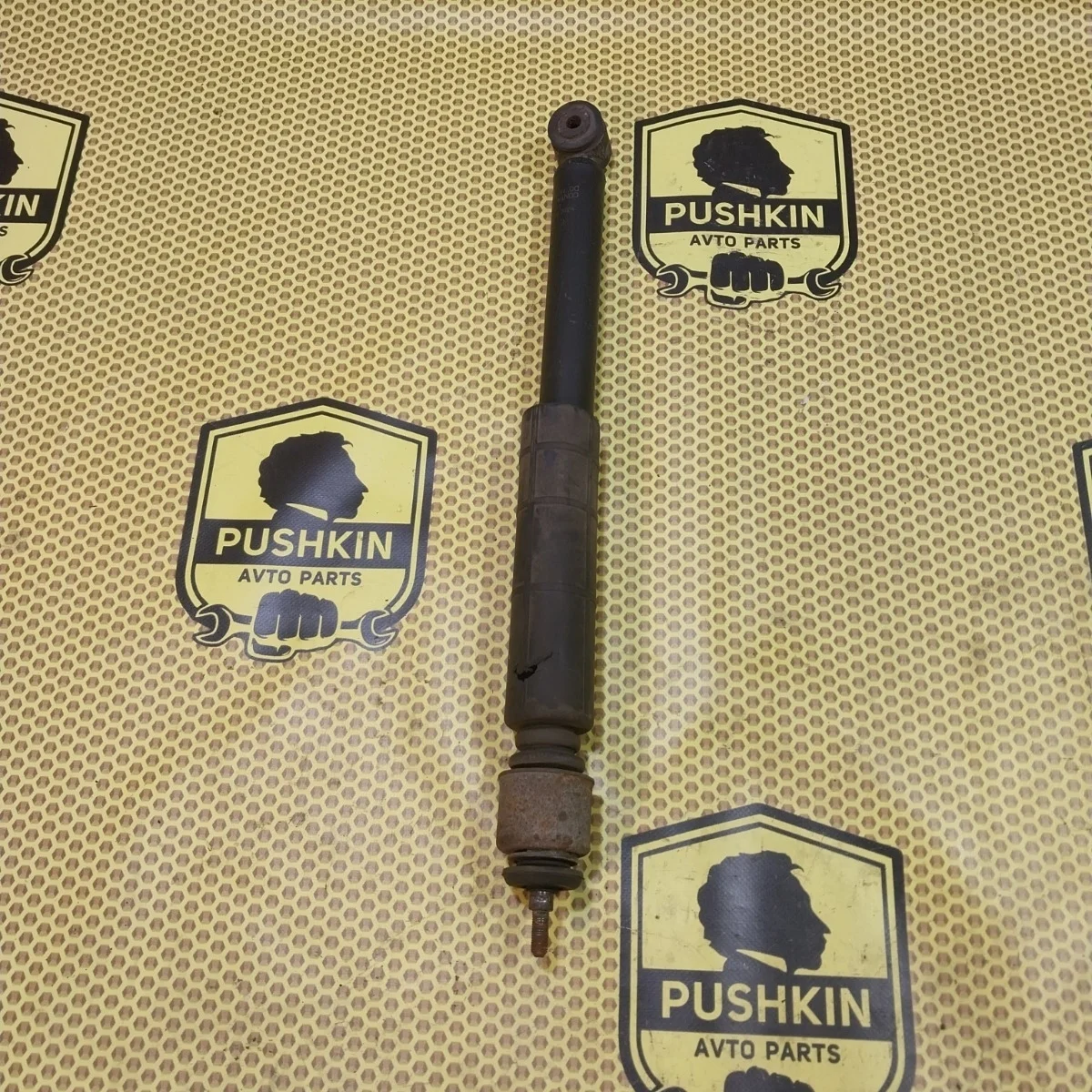 Амортизатор подвески Nissan Tiida 2009 E6200ZN90A C11, задний