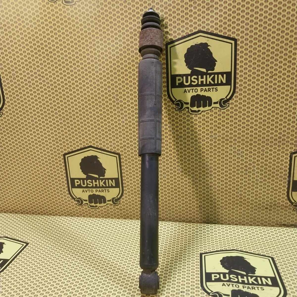 Амортизатор подвески Nissan Tiida 2009 E6200ZN90A C11, задний