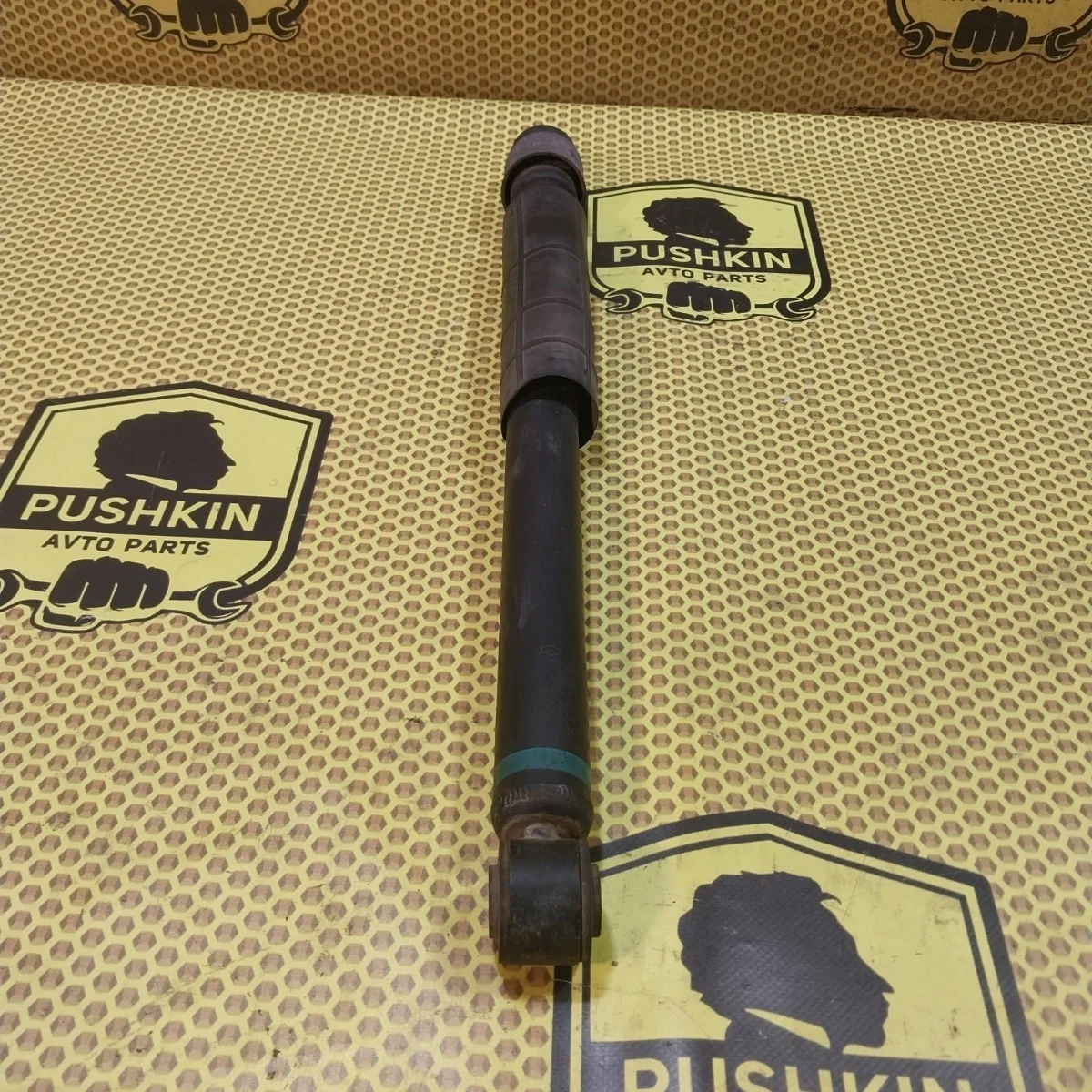 Амортизатор подвески Nissan Tiida 2009 E6200ZN90A C11, задний