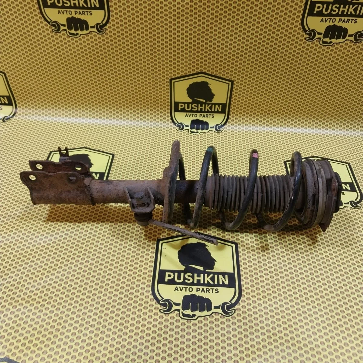 Амортизатор подвески Nissan Xtrail 2009 E43031DA1A T31, передний левый