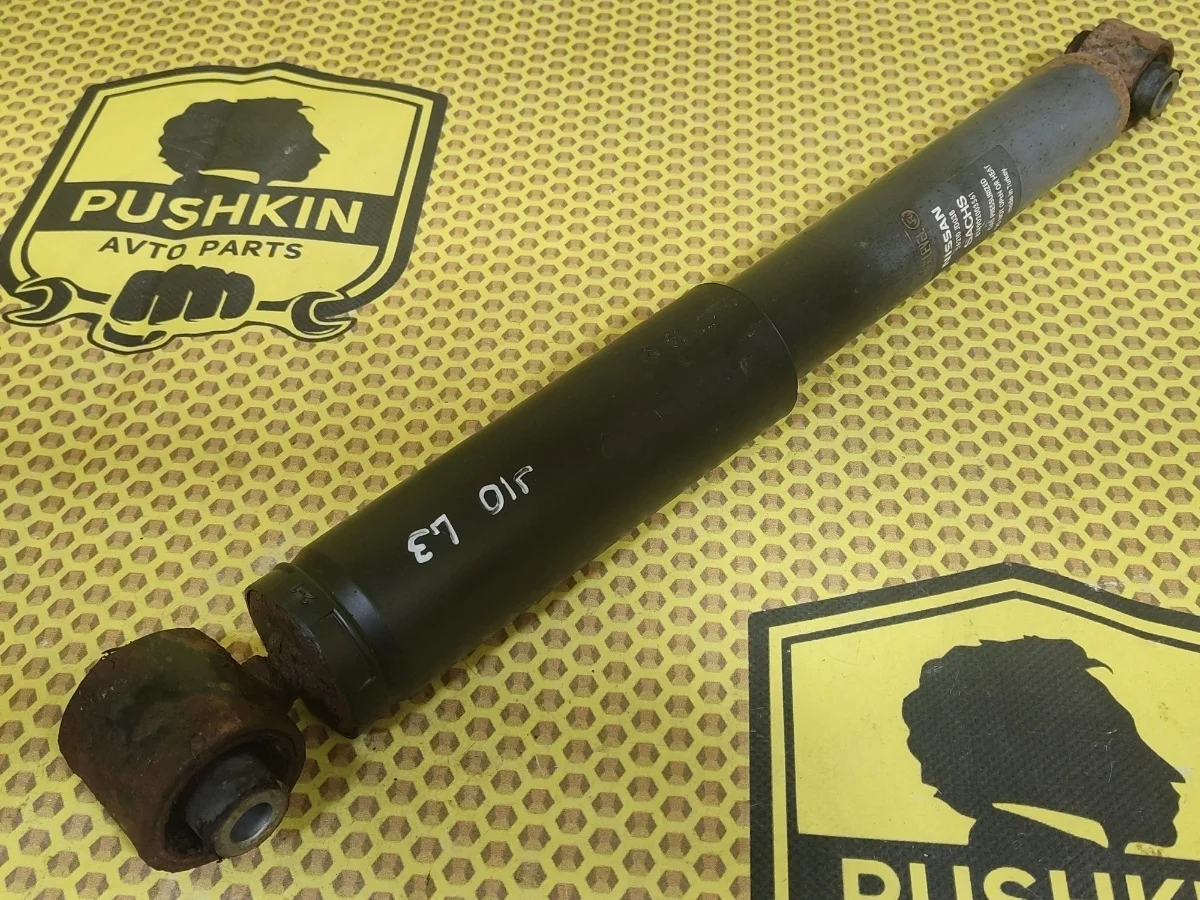 Амортизатор подвески Nissan Qashqai 2008 E6210JD02A J10E K9K, задний левый