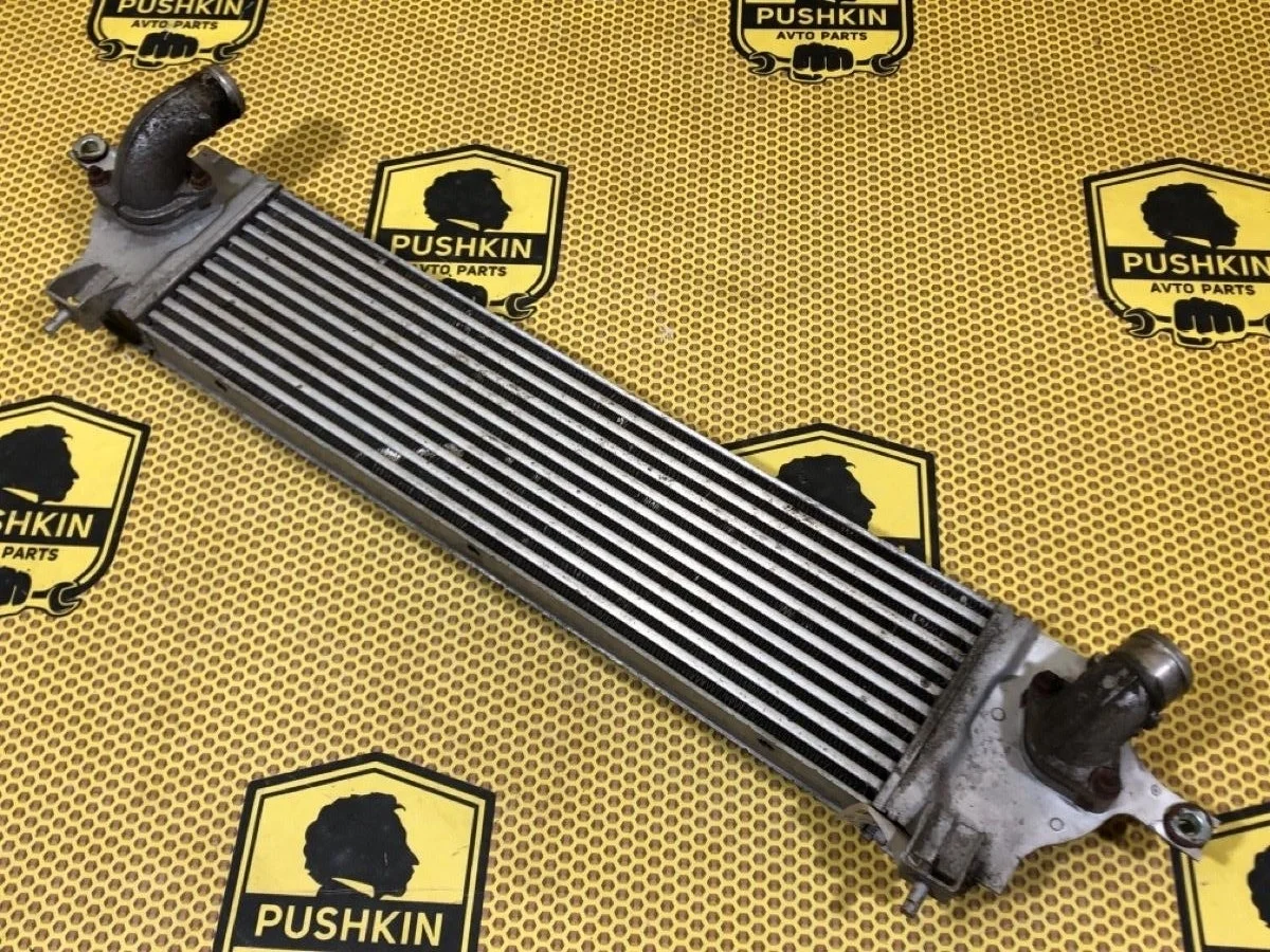 Интеркулер Nissan Qashqai 2008 14461JD50A J10E K9K