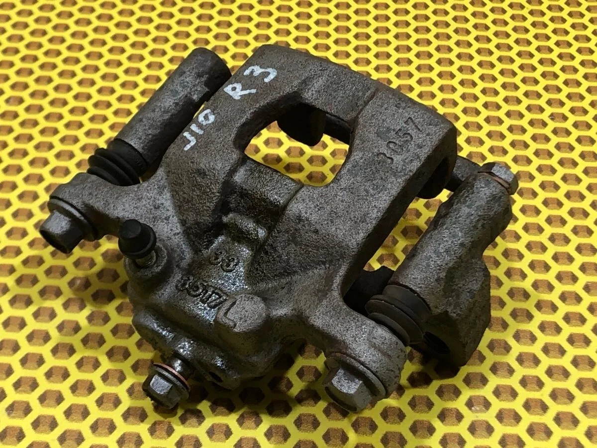 Суппорт Nissan Qashqai 2008 44001EM11A J10E K9K, задний правый