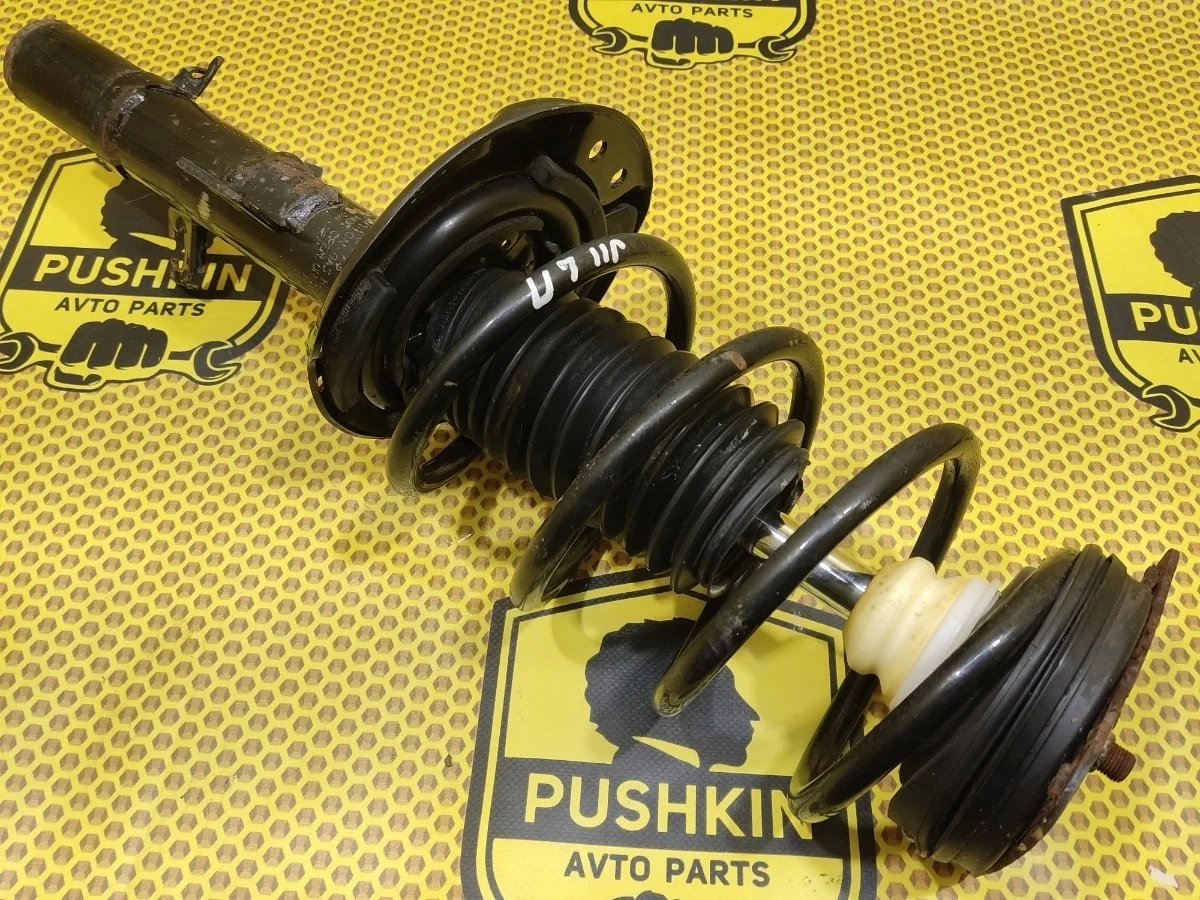 Амортизатор подвески Nissan Qashqai 2014 E43034EA6B J11 HRA2DDT, передний левый