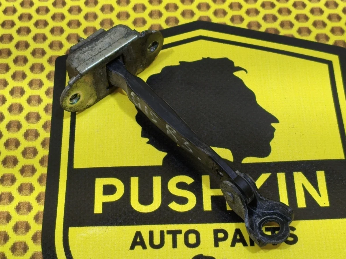 Ограничитель двери Nissan Almera 2015 82430EW000 G15 K4M, задний правый