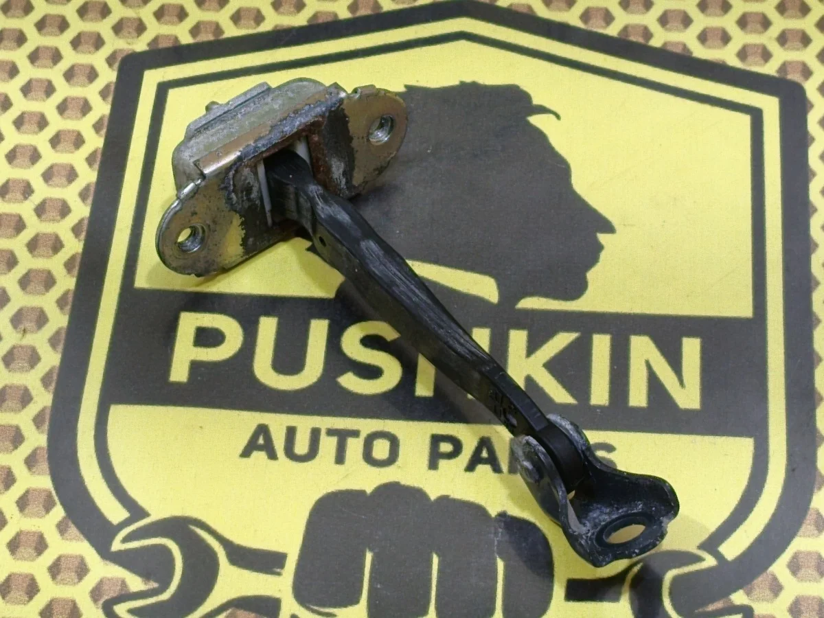 Ограничитель двери Nissan Almera 2015 82430EW000 G15 K4M, задний левый