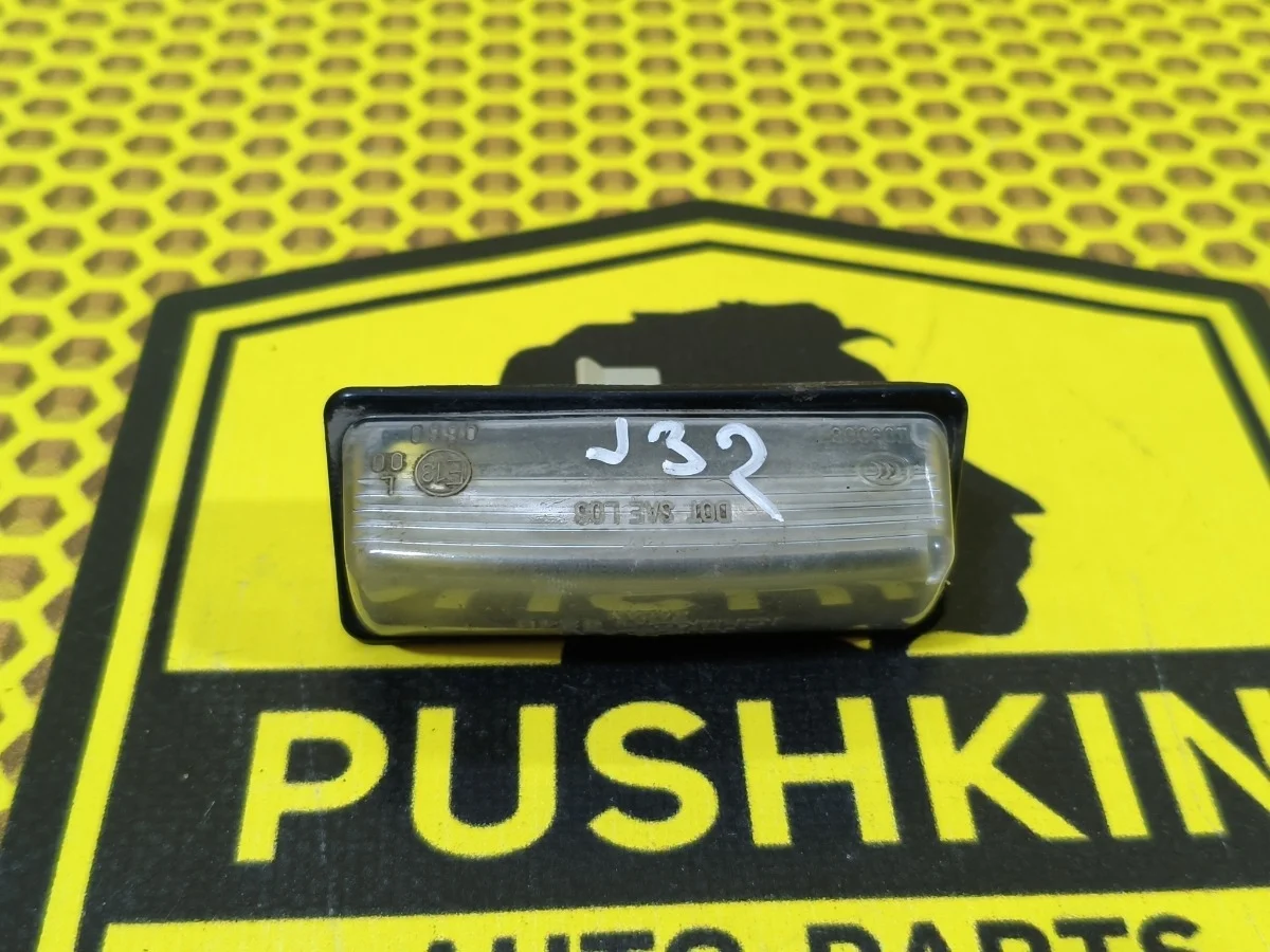 Подсветка номера Nissan Teana 2012 265109Y00A J32 VQ25DE, левая