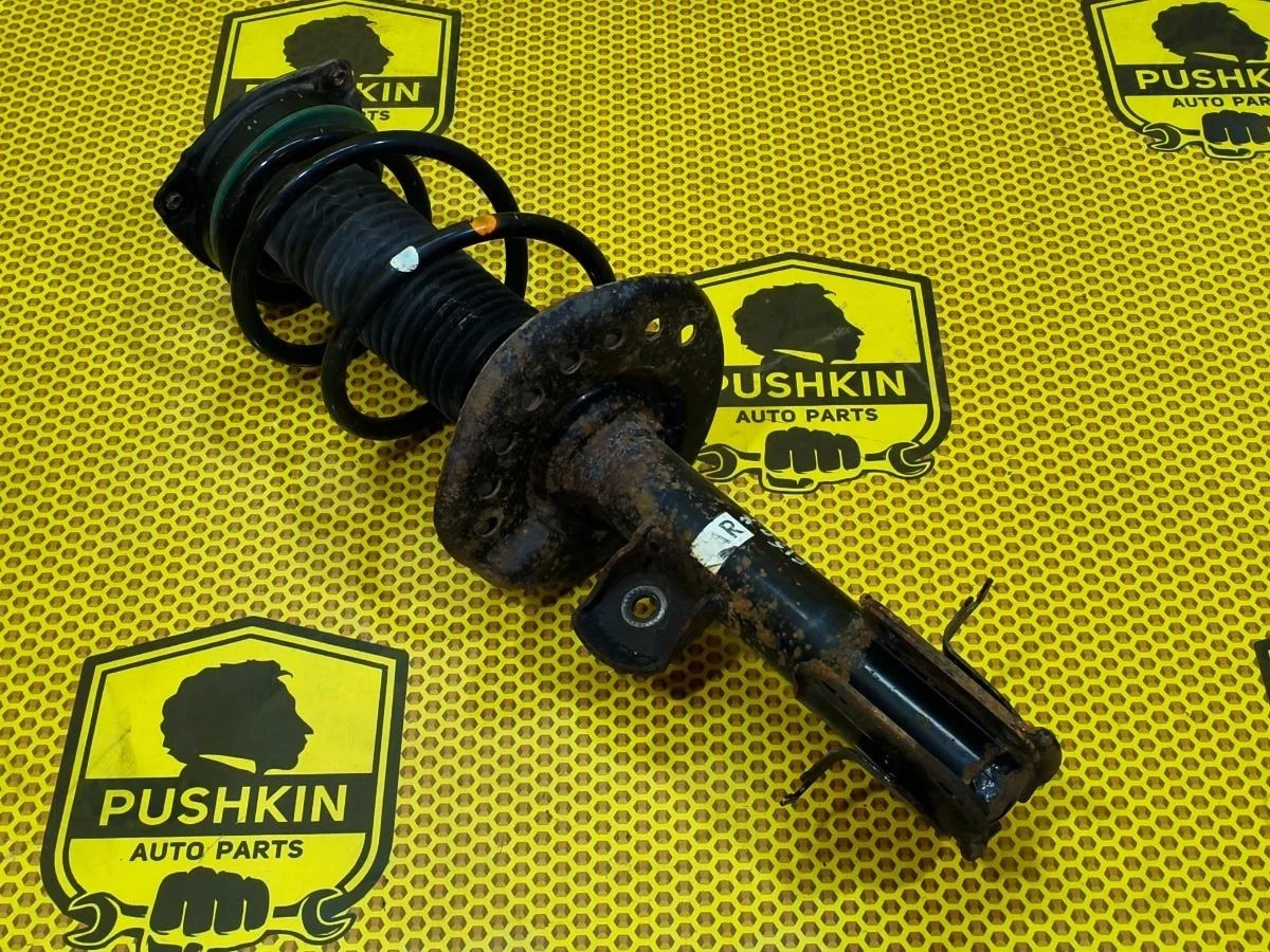 Амортизатор подвески Nissan Juke 2011 E43021KC2A F15 MR16DDT, передний правый