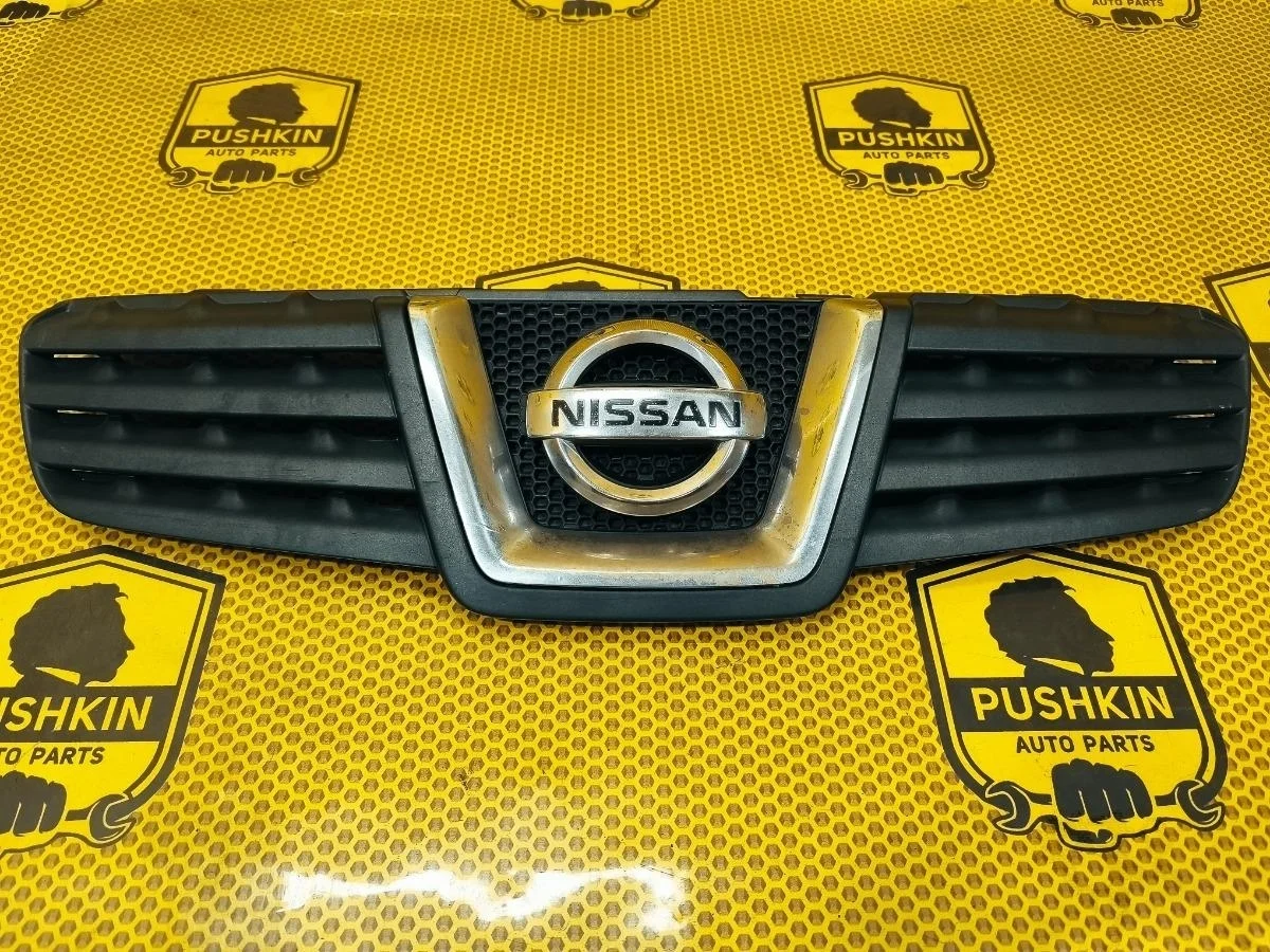 Решетка радиатора Nissan Qashqai 2008 62310JD00B J10 HR16DE