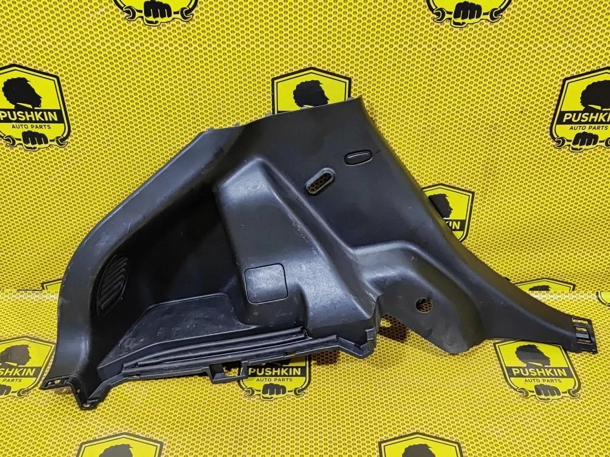 Обшивка багажника боковая нижняя Nissan Juke 2014 849511KB1A F15 HR16DE, левая