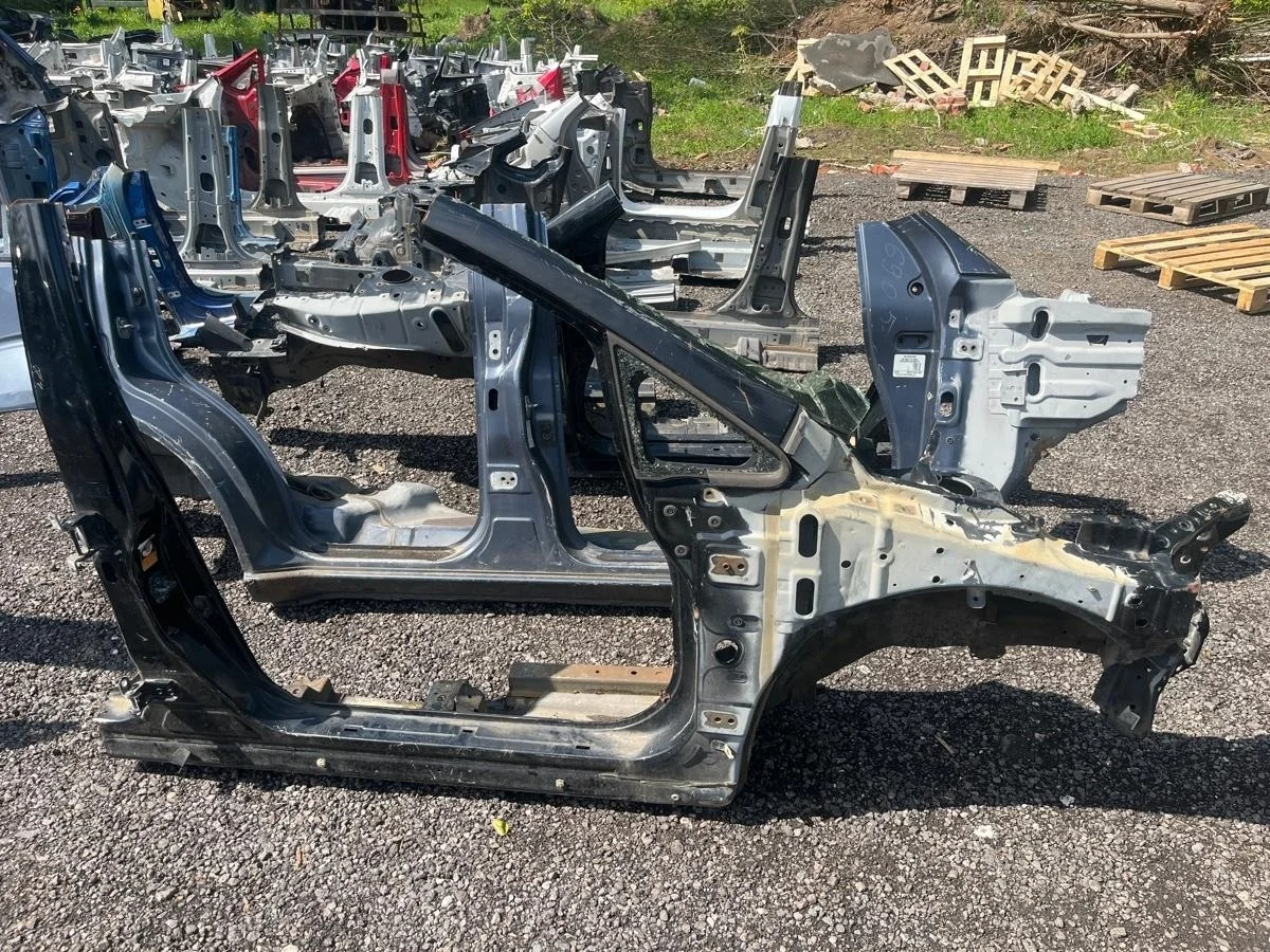 Часть кузова четверть Nissan Tiida 2010 64180EL030 SC11X HR16DE, передний правый